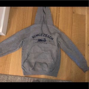 distressed and used Venice beach sweatshirt